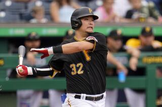 AP source Pirates bring back 1B Tsutsugo on 1 year deal AP News